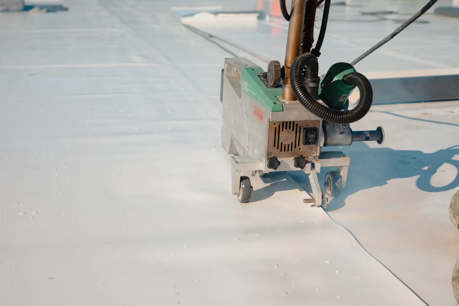 Membrane and insulation work on a low-slope roof